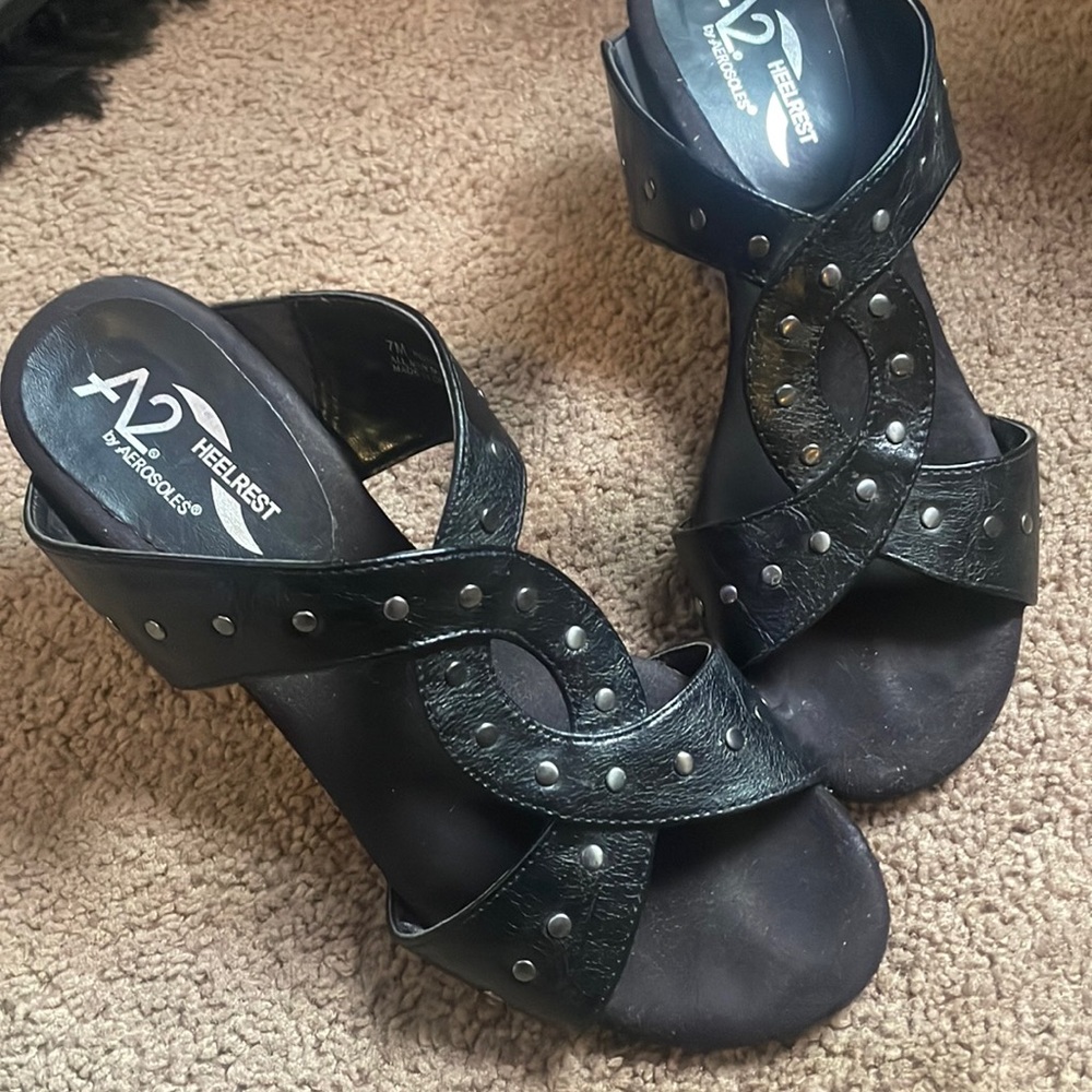 Size 7 studded black mule sandals with 2" heel